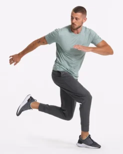 Tradewind Performance Tee | Neptune Heather 12 Tradewind Performance Tee | Neptune Heather -Vuori Clothing Store V109HNP SP23 M ECOMM TOPS DETAIL 3304 1x1 5567d5a0 3c2c 4da0 bf53 9b9f63a3b36c