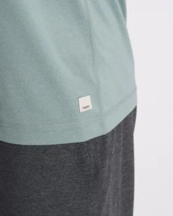 Tradewind Performance Tee | Neptune Heather 13 Tradewind Performance Tee | Neptune Heather -Vuori Clothing Store V109HNP SP23 M ECOMM TOPS FULL 3254 1x1 448e64f8 a026 46be b2f6 266c7077e5c3