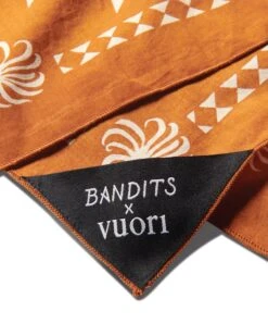 We Rise Bandana | Turmeric 5 We Rise Bandana | Turmeric -Vuori Clothing Store Vuori BanditsBandana Tobacco Detail